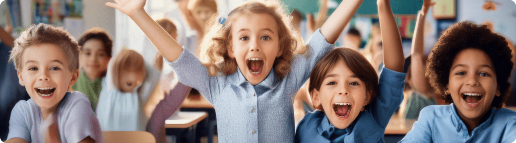 children cheer in a classroom