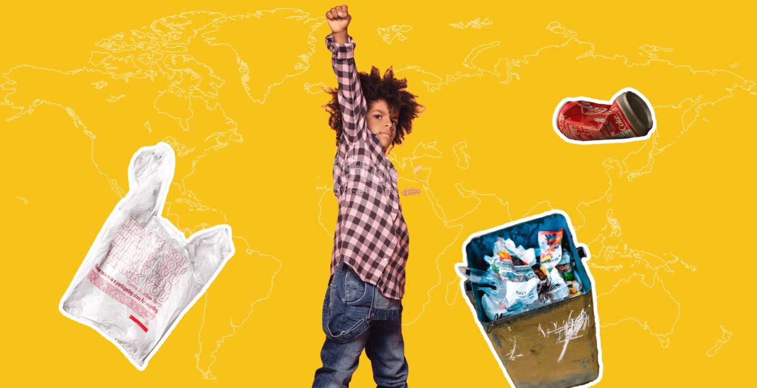 Young boy in plaid long sleeve shirt points to the above. Yellow background. Rubbish bag, can, and trash float around him